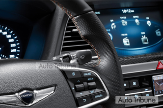 Illustration for article titled Genesis G80 Sport, The Blue Seated Carbon Fiber Trimmed Gold Stiched Steering Wheel Twin-Turbo Sedan All Three Of Us Have Been Waiting For...